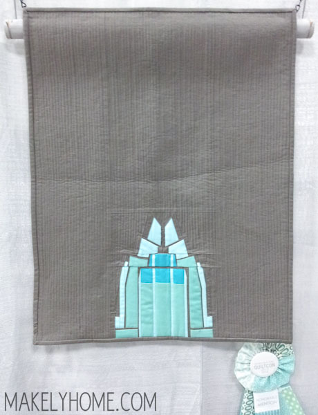 Mini modern art quilt featuring this Frost Bank building from the Austin skyline - by Claire Jain | MakelyHome.com
