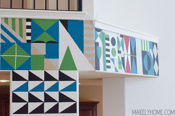 Hand painted Mary Blair inspired feature wall via MakelyHome.com