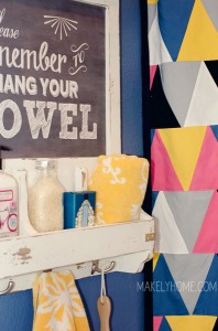 Amazing small kids' bathroom transformation with no renovations - just paint, fabric and fun styling! Via MakelyHome.com