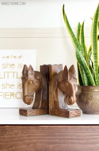 Thrift store horse bookends upstyled with gold glitter.